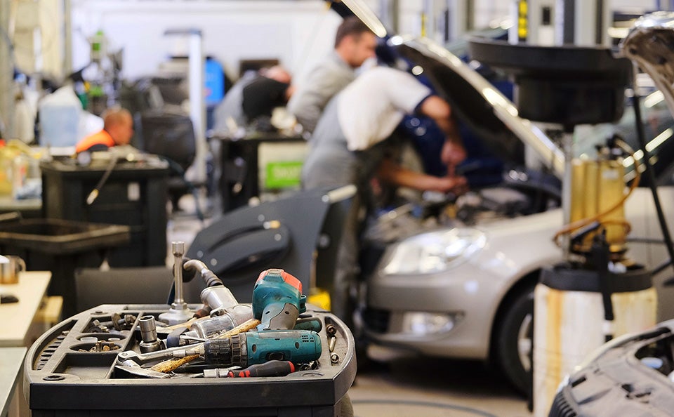 Inside of a mechanics shop while a car is being serviced - Bergstrom GMC of Manitowoc in MANITOWOC WI